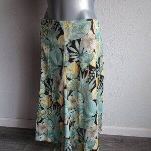 Midi tropical print skirt 1940s era. Size 14. Greens and browns, flared swirl.